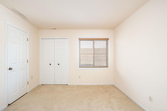 25540 Waterview Dr, Harrison Twp, MI 48045 - unfurnished bedroom featuring light colored carpet, baseboards, and visible vents