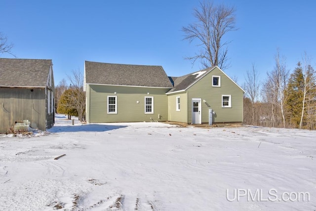 view of snow covered property