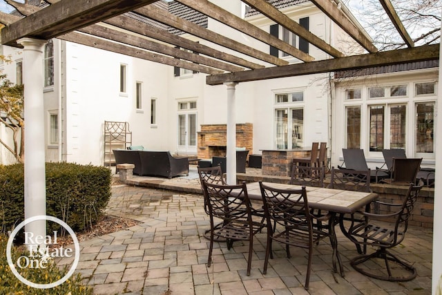 view of patio / terrace with outdoor dining area, an outdoor hangout area, and a pergola