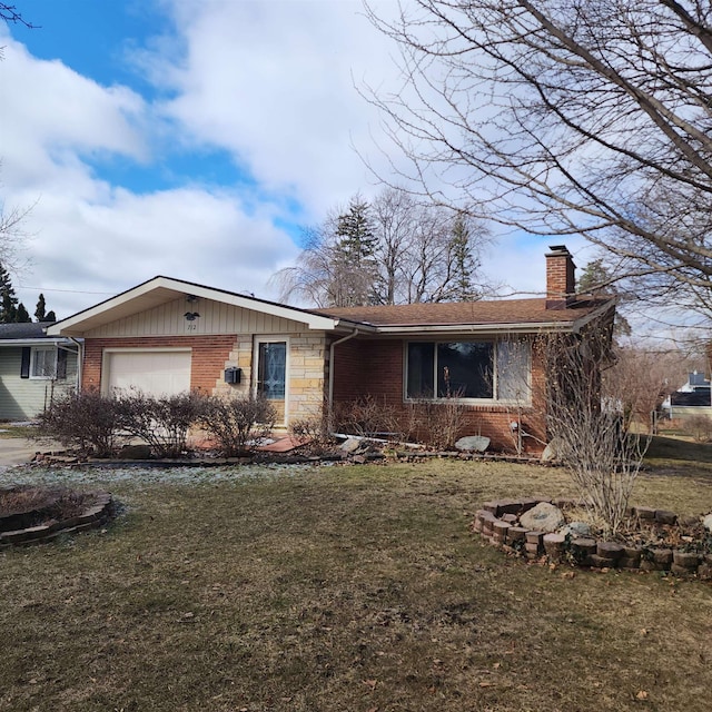 ranch-style home with an attached garage, a front yard, a chimney, and brick siding