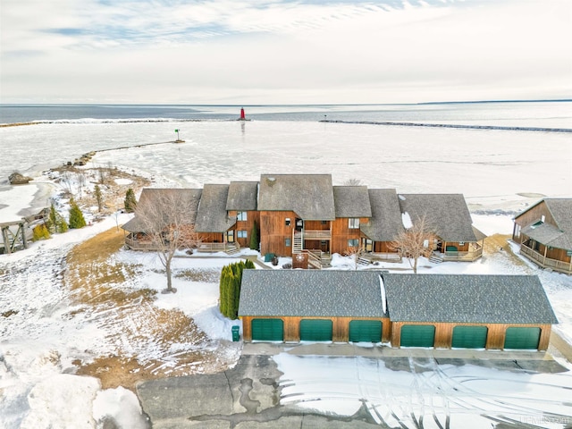 drone / aerial view with a view of the beach and a water view