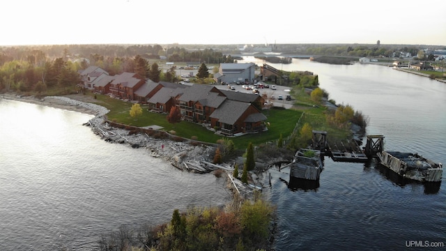 aerial view featuring a water view and a residential view