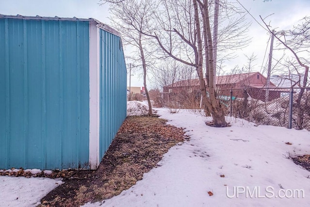 view of yard covered in snow