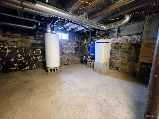 basement featuring water heater