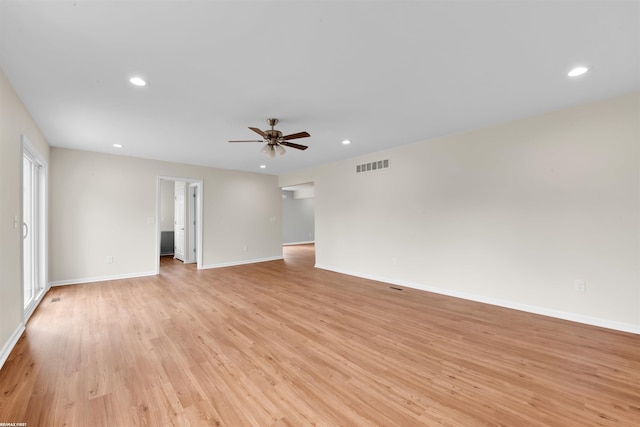 unfurnished room featuring visible vents, baseboards, ceiling fan, light wood-type flooring, and recessed lighting