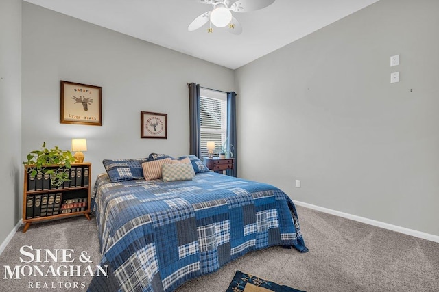 carpeted bedroom with a ceiling fan and baseboards