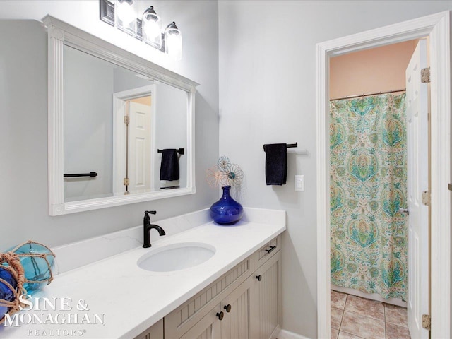 full bathroom with vanity, tile patterned floors, and a shower with shower curtain