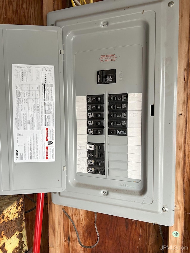 utility room featuring electric panel