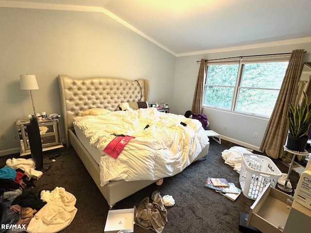 bedroom featuring baseboards, carpet, crown molding, and vaulted ceiling