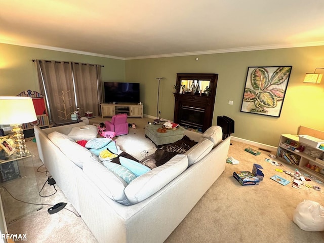 carpeted living area with baseboards, ornamental molding, and a fireplace