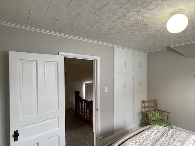 unfurnished bedroom featuring crown molding