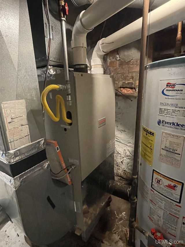 utility room featuring gas water heater