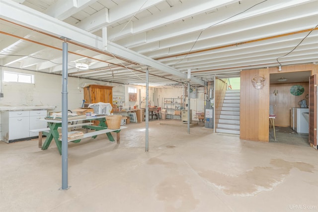 basement featuring stairway and separate washer and dryer