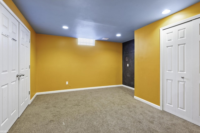 below grade area with recessed lighting, carpet, and baseboards