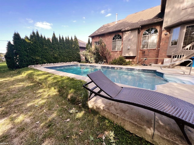 outdoor pool featuring a patio area