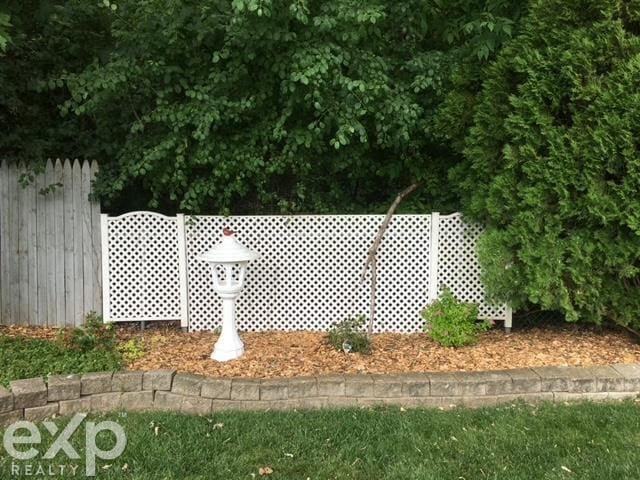 exterior details featuring fence