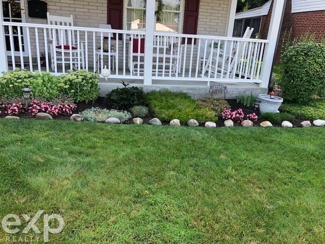 view of yard featuring a porch