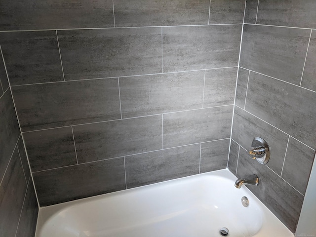 full bathroom featuring  shower combination