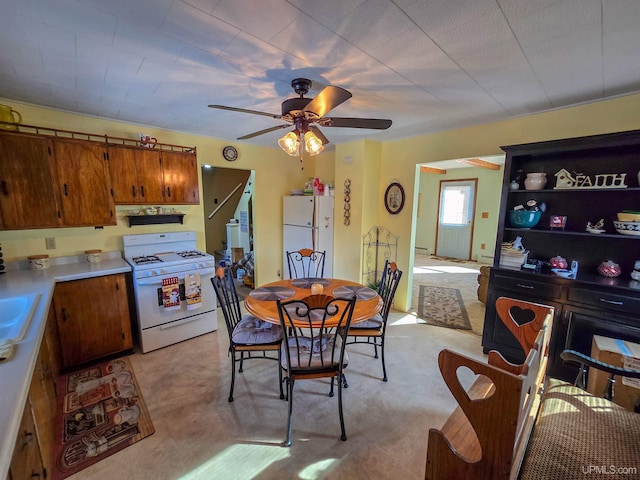 dining area with ceiling fan