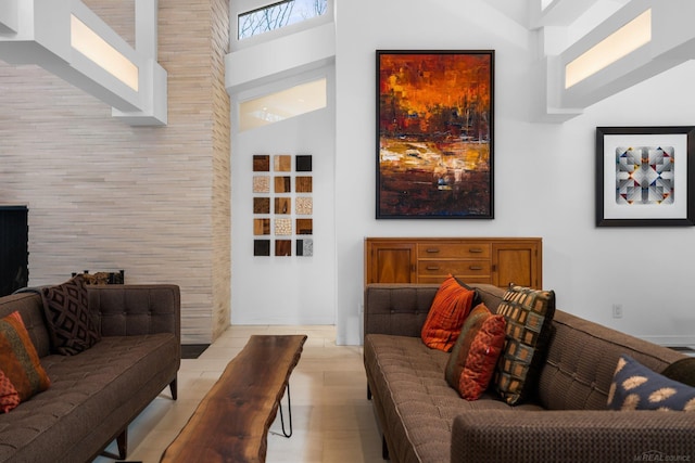 living room with a high ceiling