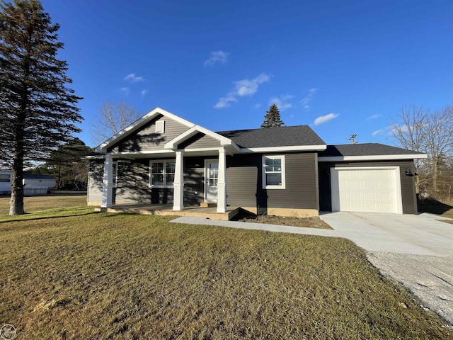 ranch-style house featuring driveway, a porch, roof with shingles, an attached garage, and a front yard