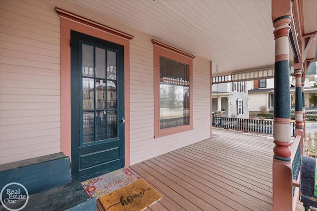 wooden terrace featuring a porch