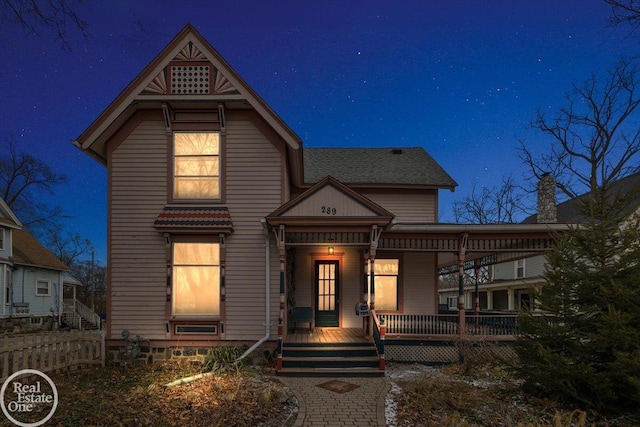 victorian-style house with a porch