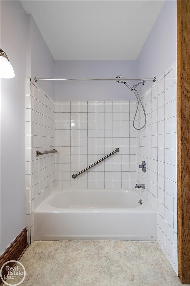 full bath featuring tub / shower combination