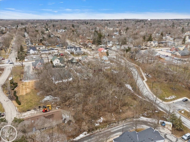 birds eye view of property with a residential view