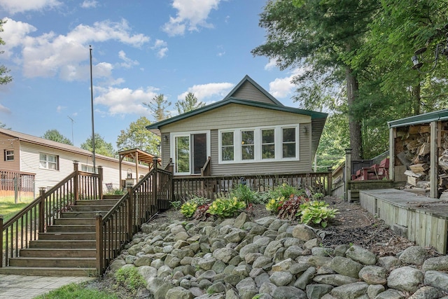 view of front of property with a deck