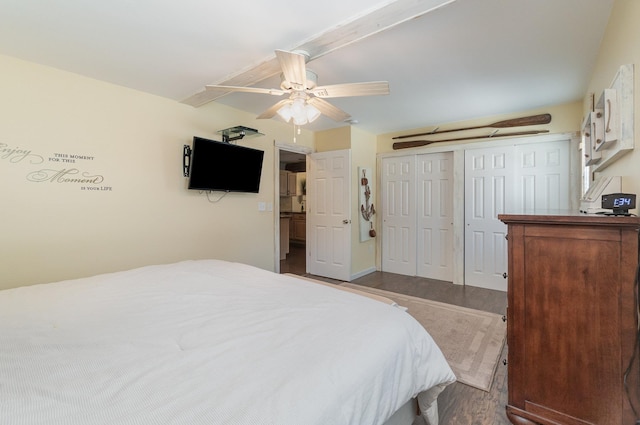 bedroom with wood finished floors, a closet, and ceiling fan