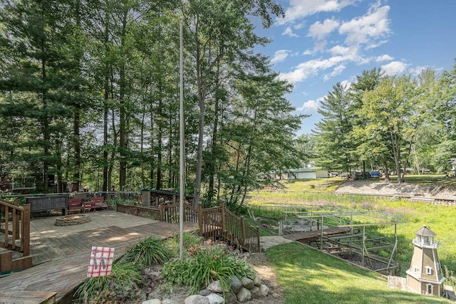 view of yard featuring a wooden deck