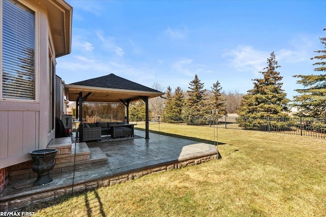 view of yard featuring a patio, a fenced backyard, and an outdoor hangout area