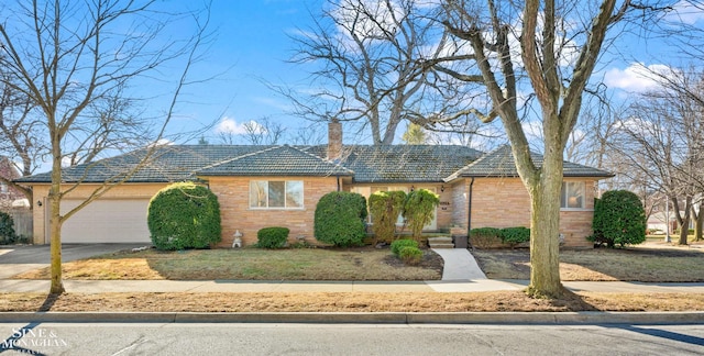 ranch-style home with a chimney, stone siding, concrete driveway, and a garage