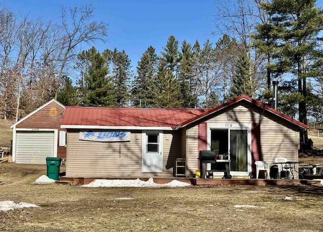 view of front of house featuring metal roof