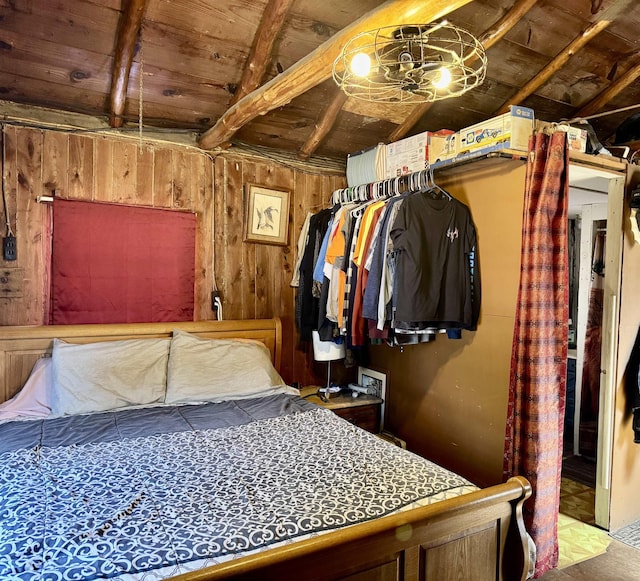 bedroom featuring wood walls, wood ceiling, and lofted ceiling with beams