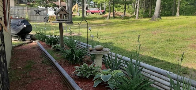 view of yard with fence