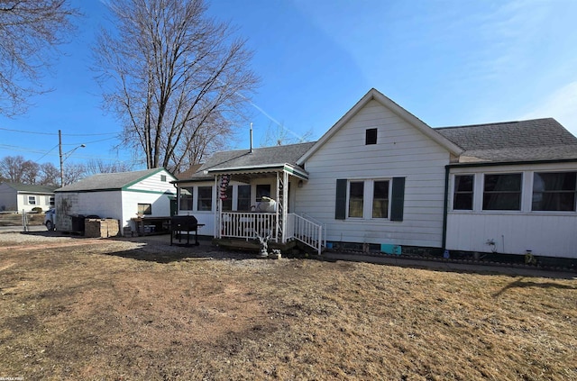 view of front of house featuring roof with shingles