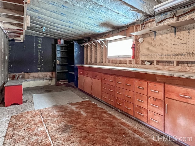 bathroom featuring vaulted ceiling and mail area