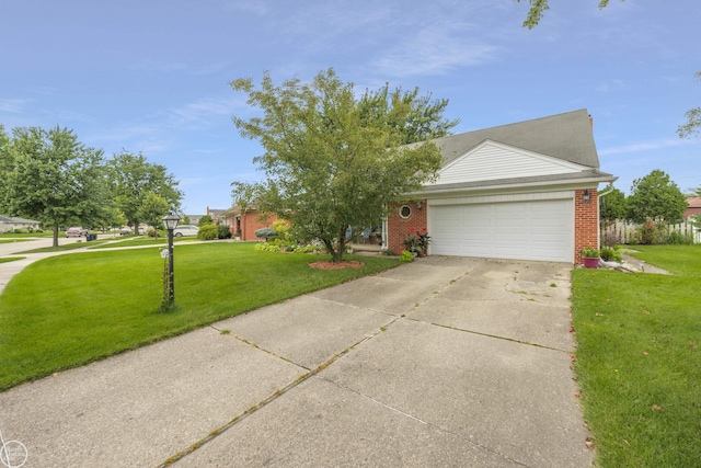 view of front of property featuring brick siding, an attached garage, concrete driveway, and a front lawn