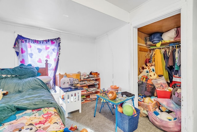 bedroom with a closet and carpet floors