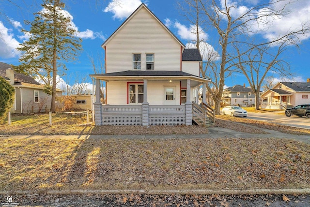 view of front facade featuring a residential view and a porch