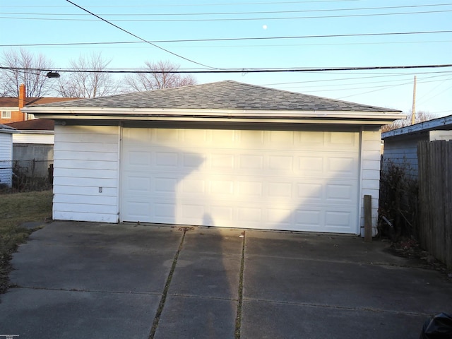 detached garage with fence