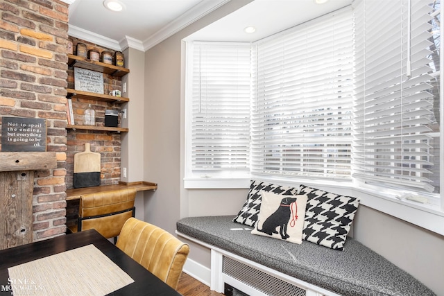 home office featuring recessed lighting, plenty of natural light, wood finished floors, and crown molding