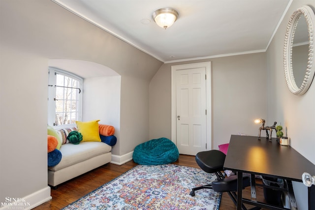 office area featuring crown molding, baseboards, and wood finished floors