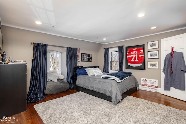 bedroom featuring recessed lighting and dark wood-style flooring