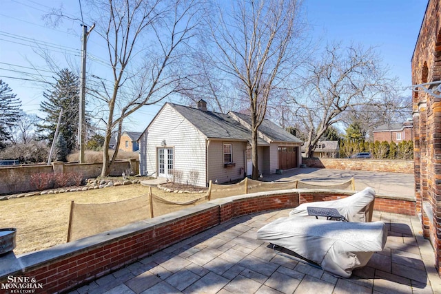 view of patio with a garage