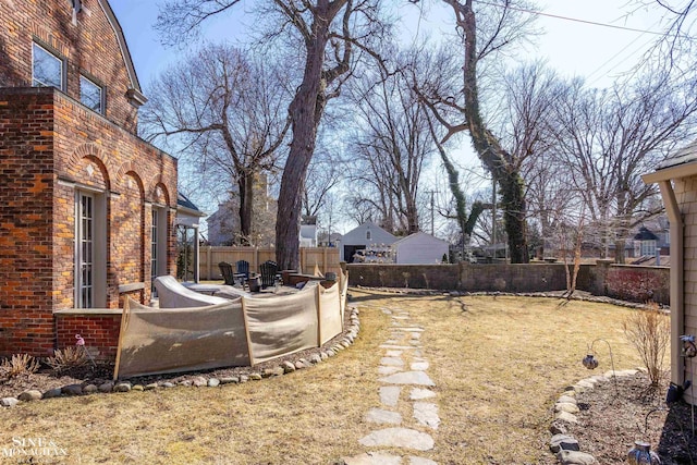 view of yard with a fenced backyard