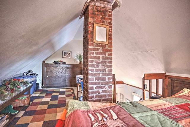 unfurnished bedroom with vaulted ceiling