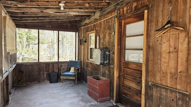 unfurnished sunroom with a wealth of natural light